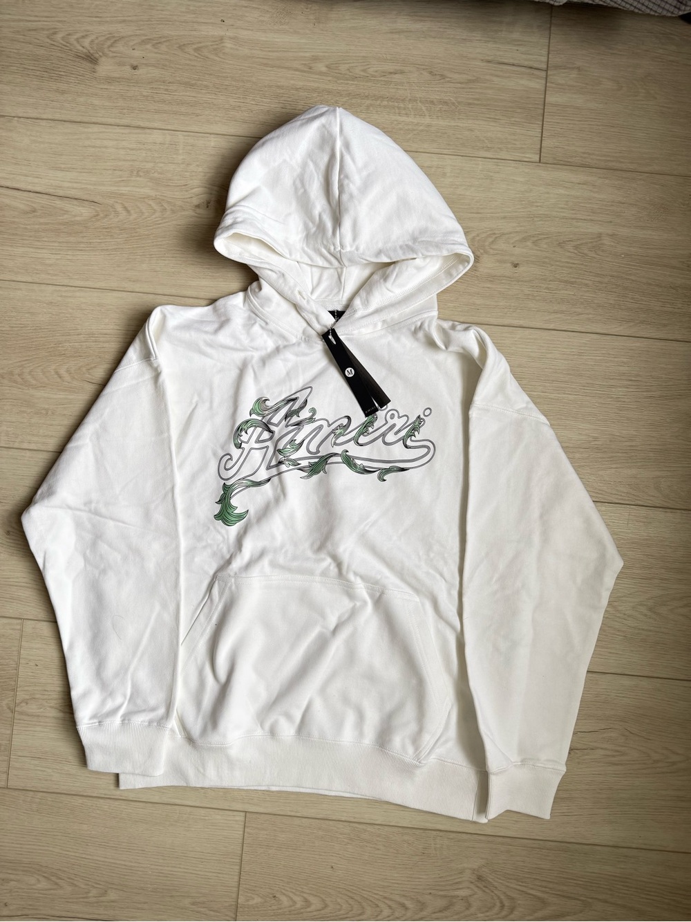 AMIRI White Hoodie with Green Logo Accents